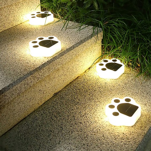 Luz solar jardín estaca diseño huella cálida Luz solar jardín estaca diseño huella cálida